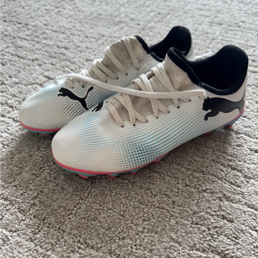 Puma White and Black Sneakers with Modern Streamlined Design